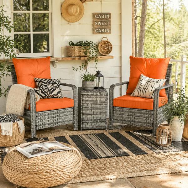 Wyld Haus Nola Nora Gey Rattan 3 Piece Bistro Set With Storage Coffee Table And Orange Cushions