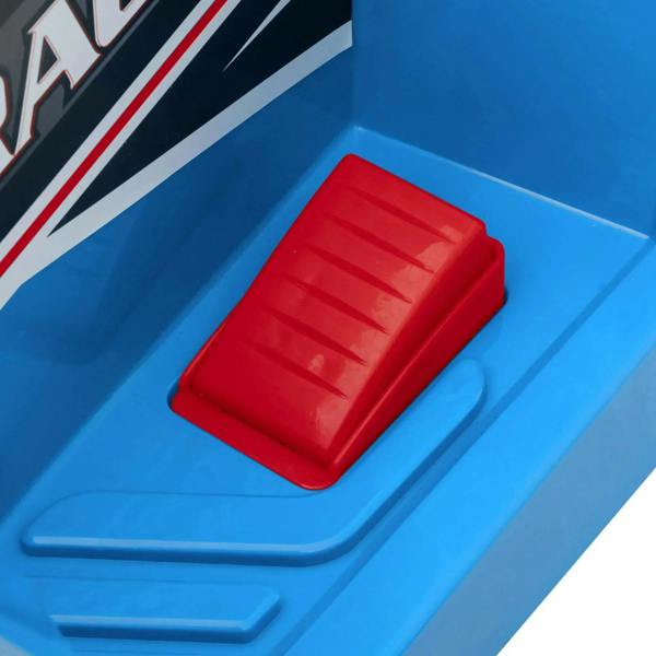 Red battery compartment cover on blue ride-on quad bike body