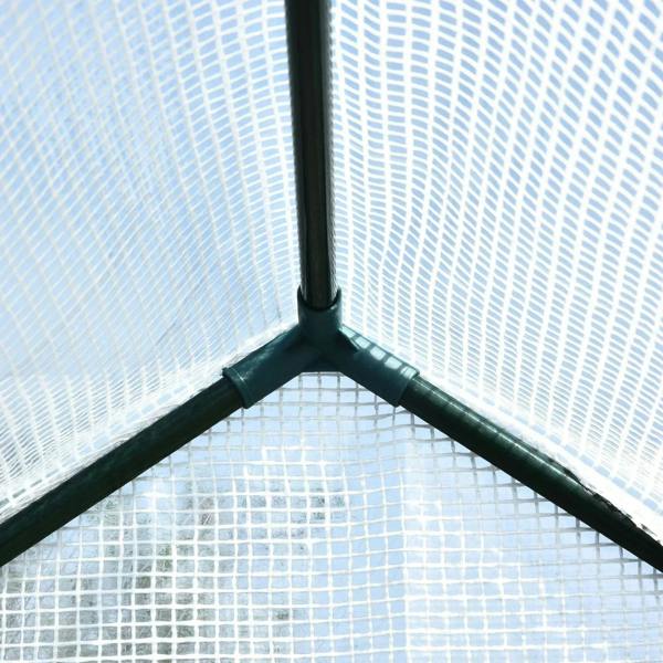 Walk-in greenhouse corner with dark frame tubes and mesh polytunnel cover
