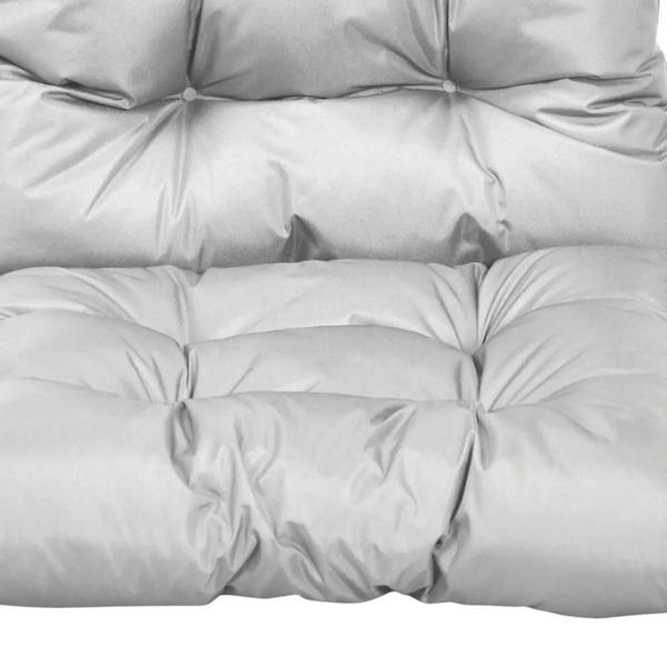 Light grey seat cushion close-up with tufted padding and stitched channels