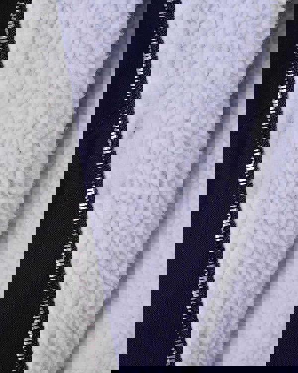 Lambretta Mens/Womens Carnaby Scooter Hooded Classic Mod Ska Badge Parka, close-up of the white fleece and black fabric with zipper detail.