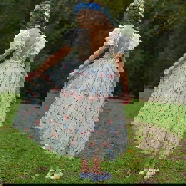 Rear detail on Freya Bella dress worn by model
