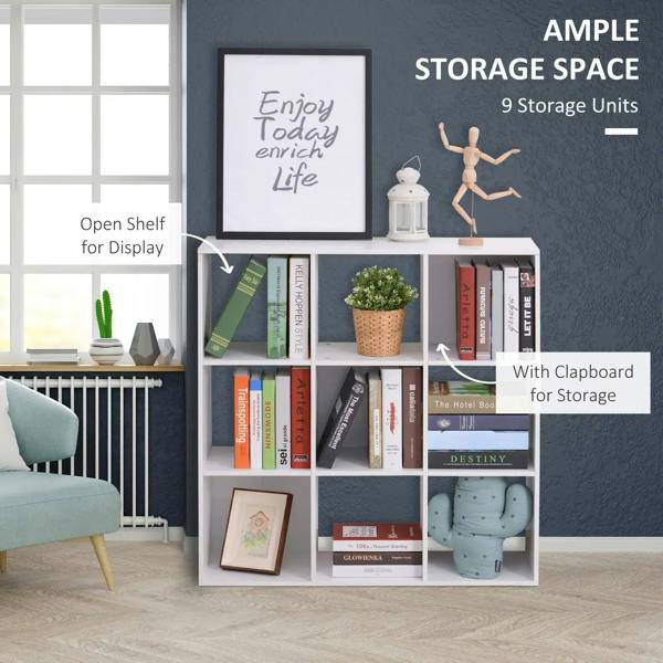 White cube storage shelf with open cubbies displaying books, decor, and a framed print.