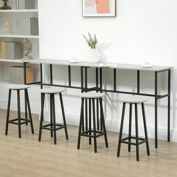 Grey counter-height bar table with four round stools, black frames and footrests