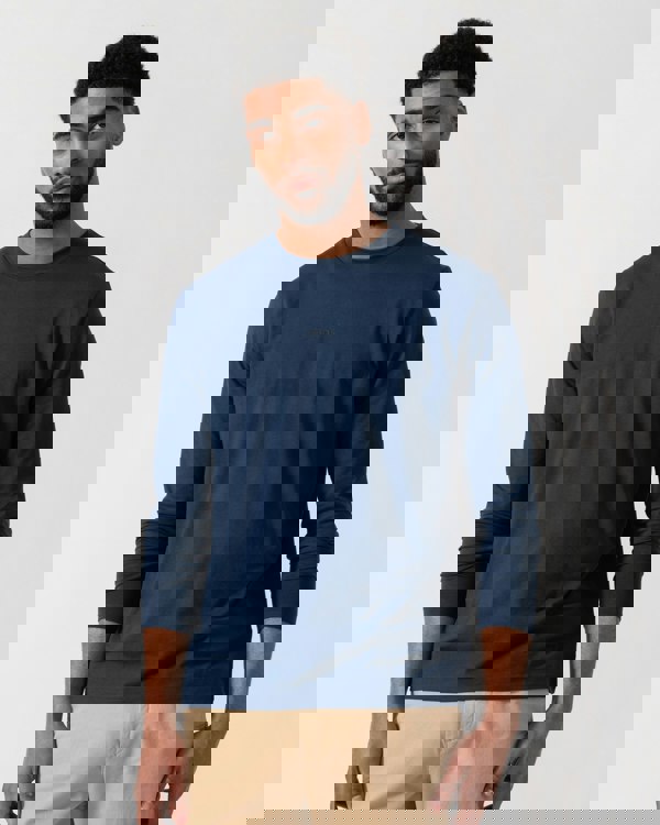 Model wearing BOSS Orange Tchark Long Sleeve Stretch Cotton T-Shirt in Open Blue 464 - Main