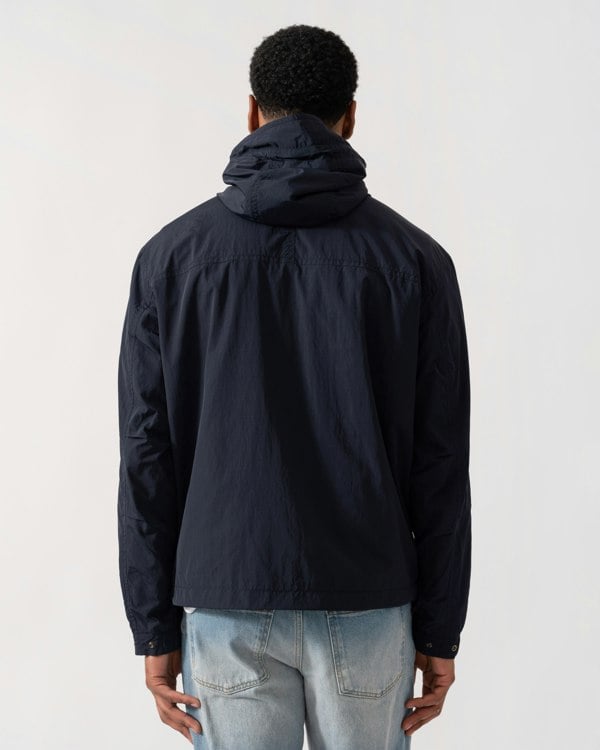 Model wearing BOSS Orange Orip Hooded Jacket in Dark Blue 404 - back