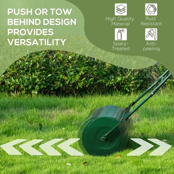Green push lawn roller with round drum and handle on lawn