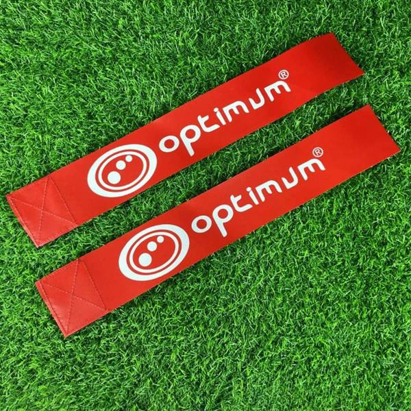 Two red Optimum tag rugby flags with white logo print, laid on grass
