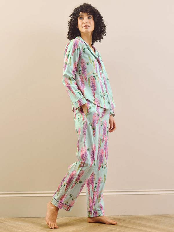 model wears wisteria print short pyjama set. 