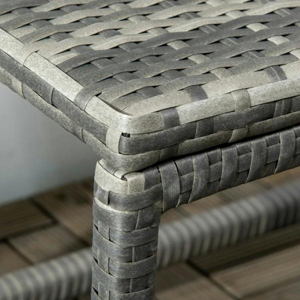 Grey woven rattan table corner with protective edge and stacked weave detailing