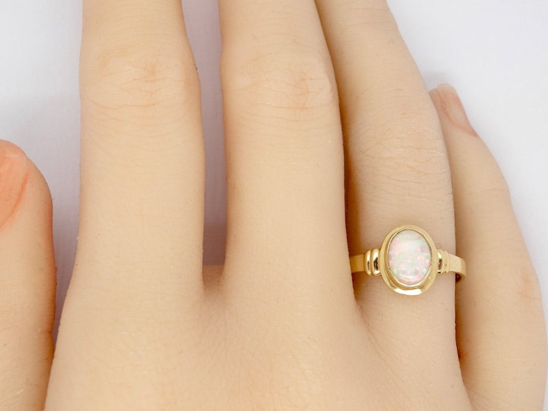 An Opal Dress Ring finger view