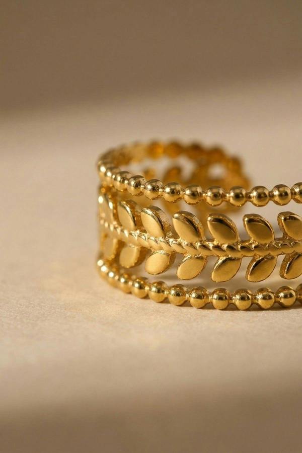 ARIIRA Meadow Gold Tone Open Leaf Band