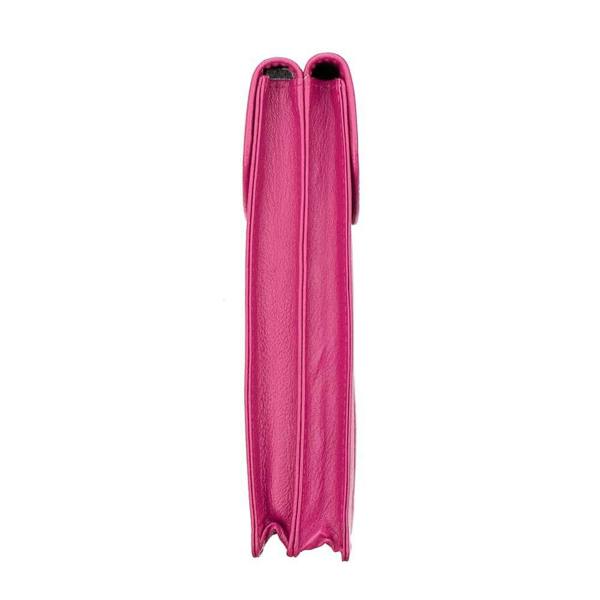 Side profile of compact Fuchsia leather glasses case showing 1cm slim design