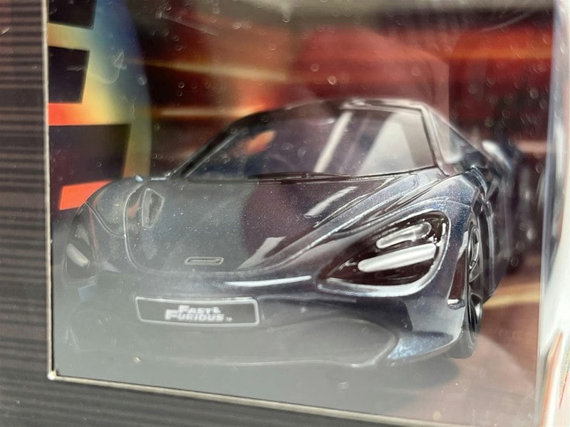 a toy car in a box
