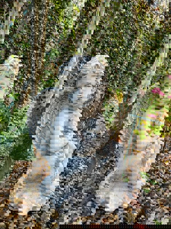 Stone Cast Cherub Ornament with Teddy on Hand