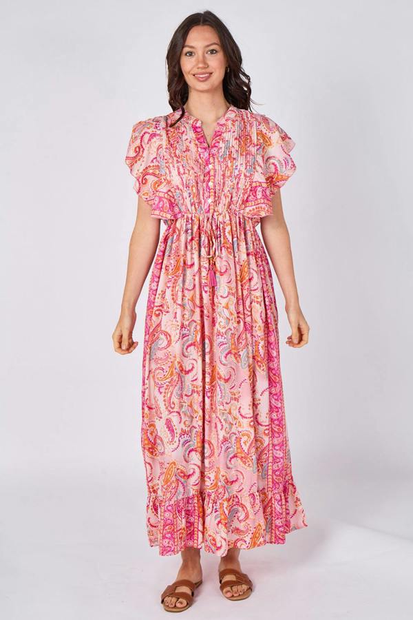 Woman wearing a pink floral dress on a white background