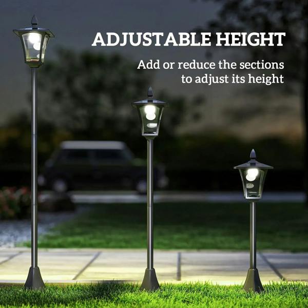 Adjustable-height black outdoor post lantern with lit glass panels on pole
