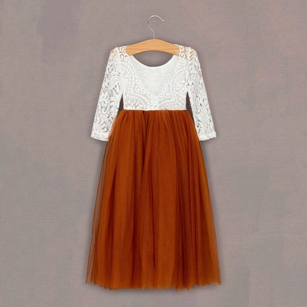 Rear Burnt orange tulle dress on hanger