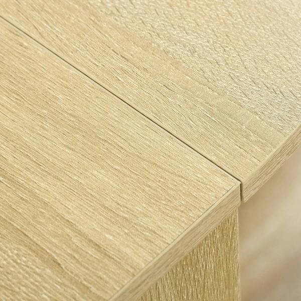 Oak veneered tabletop corner with detailed wood grain and edge seam