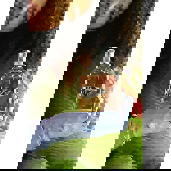 Sapil Rave Women Eau de Parfum closeup of bottle in hand