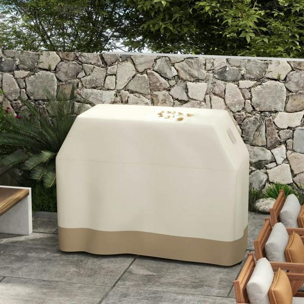 Beige grill cover fitted over a barbecue grill outdoors