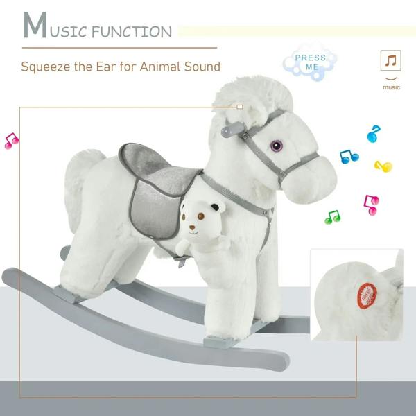 White plush rocking horse with gray saddle and gray rocker base, showing ear button