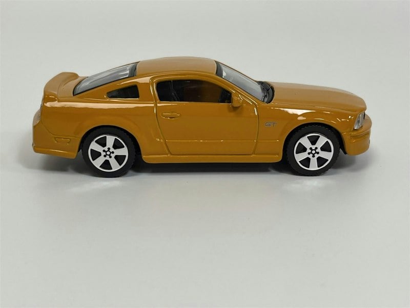 Burago 2006 Ford Mustang GT Orange 1:43 Scale - 183000
