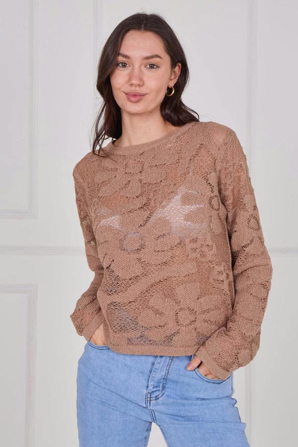 Model wearing a long sleeve crochet top with an open-knit pattern, styled with high-waisted jeans, featuring a relaxed fit and lightweight texture for casual everyday wear.