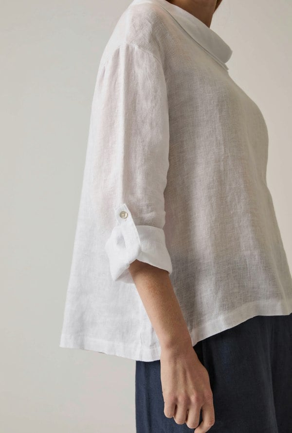 White linen top with draped cowl neckline