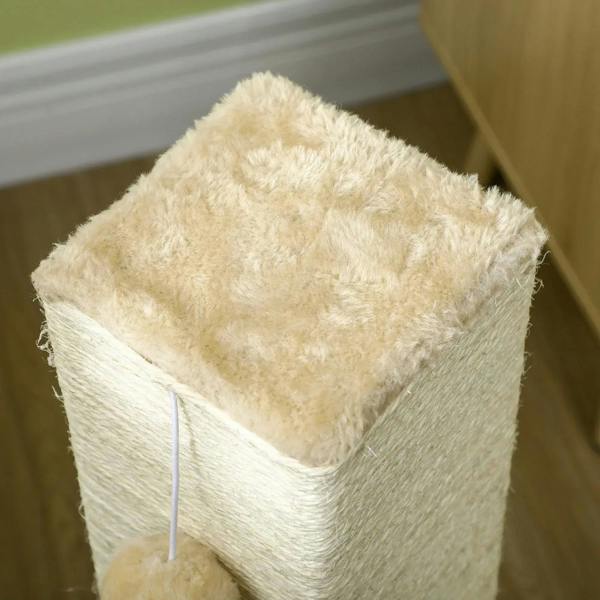Beige jute cat scratching post top on carpet base, close-up of textured surface