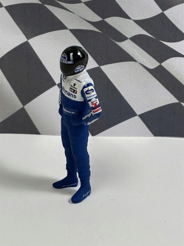 a toy figure with a helmet on
