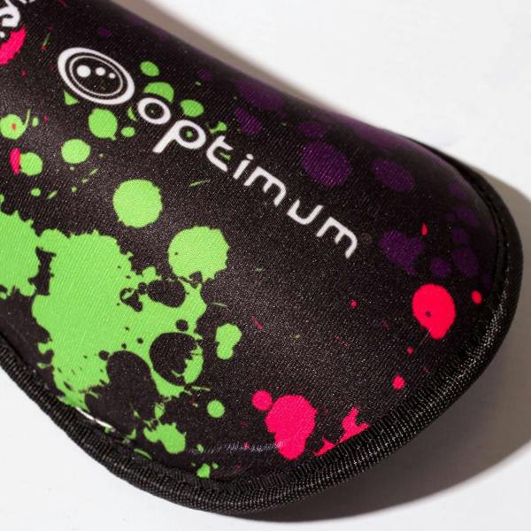Close-up of black Optimum Fusion hockey shin guard with paint-splatter print and white logo, on white - Optimum