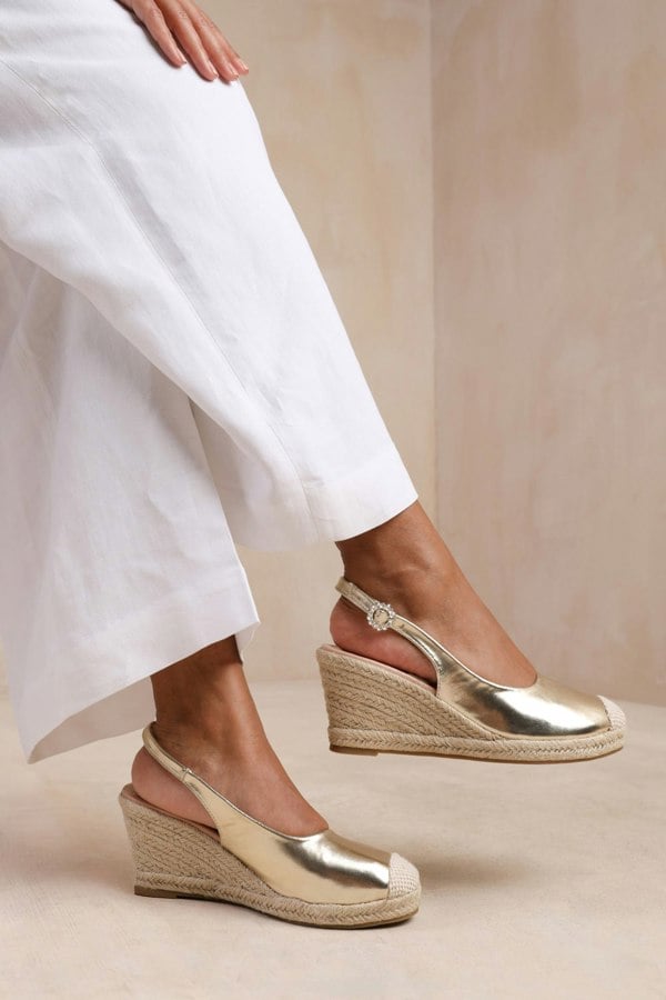 Where's That From Nevada Slingback With Diamante Flower Buckle Espadrille Wedges in Gold Metallic Faux Leather