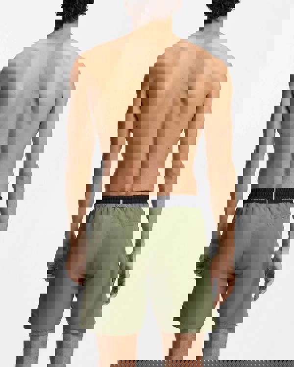 Model Wearing BOSS Orange Starfish Mens Swim Shorts in Open Green 350 - Back