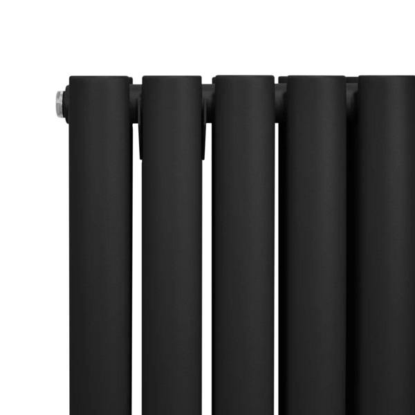 Black oval column radiator with smooth matte finish, featuring four rounded sections and sleek valves, designed for modern interiors