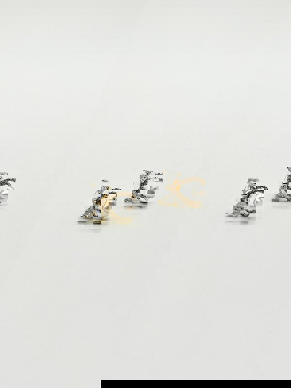 SVNX Studded Bow Earrings with Hanging Pearl in Gold Colour