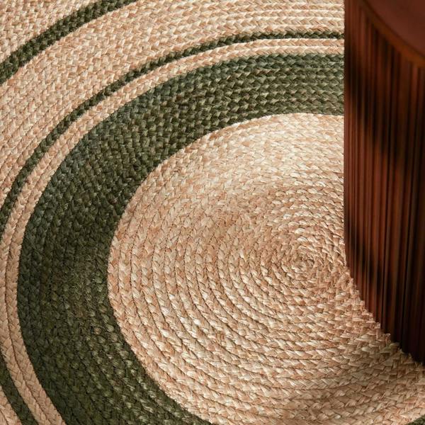 Close-up of a braided rug with concentric circular pattern