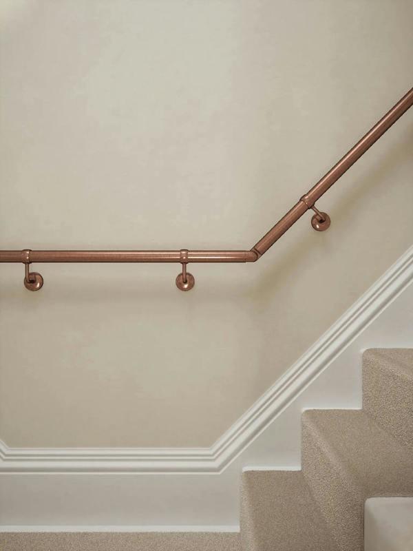 Sambourne Antique Copper T Shape Handrail showing brackets and elbow to final rise