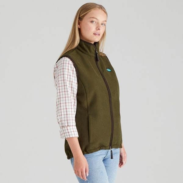 Side view of Ridgeline Womens Monarch gilet in moody teak showing flattering cut and durable zip