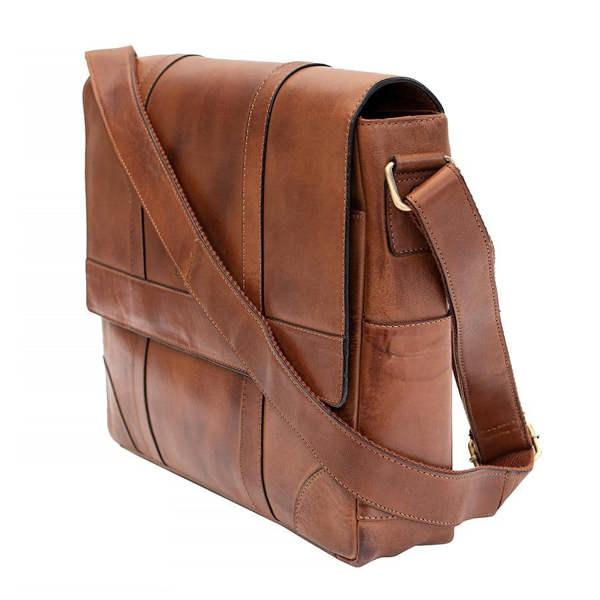 Side profile of Brown leather messenger bag showing 9cm depth and padded construction