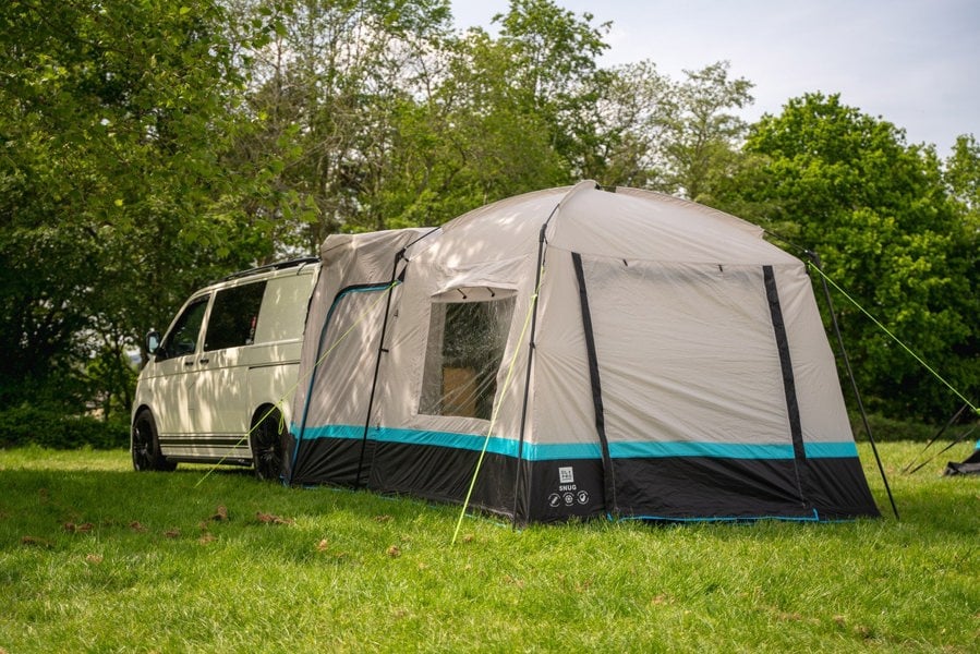 The Snug Poled Tailgate Awning photographed from the front right corner with the door shut