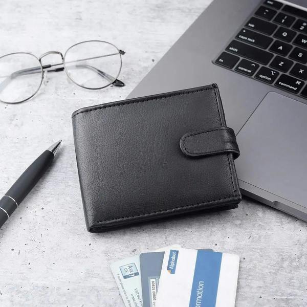 Flat lay of Basic Wallet Style 94 – RFID leather bifold wallet with zip coin pocket and accessories