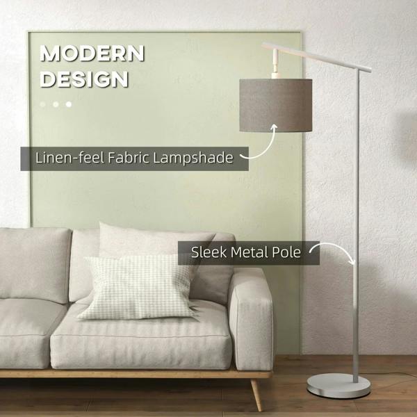 Grey linen-look drum lampshade on sleek white metal pole floor lamp