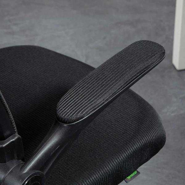 Black padded armrest and textured upholstery detail on office chair