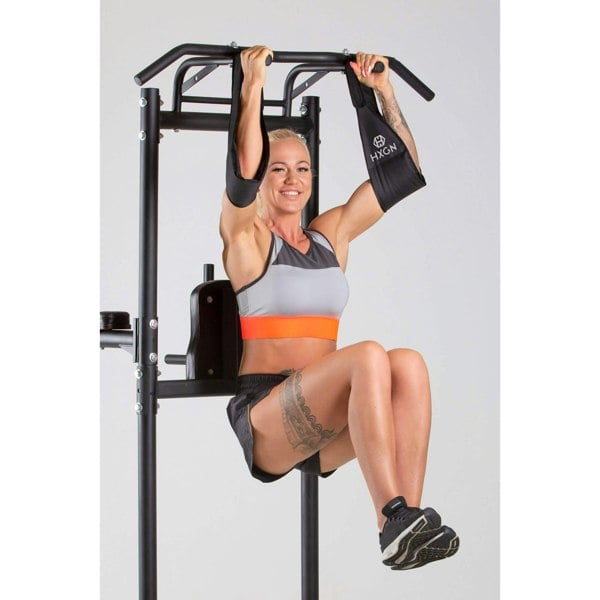 Woman wearing HXGN Adjustable Ab Straps performing a Core Workout