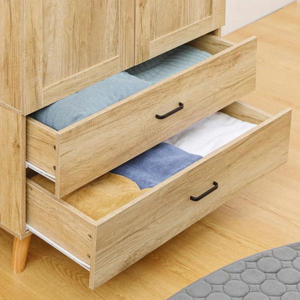 Natural wood wardrobe drawers open, showing smooth slide rails and black drawer pulls