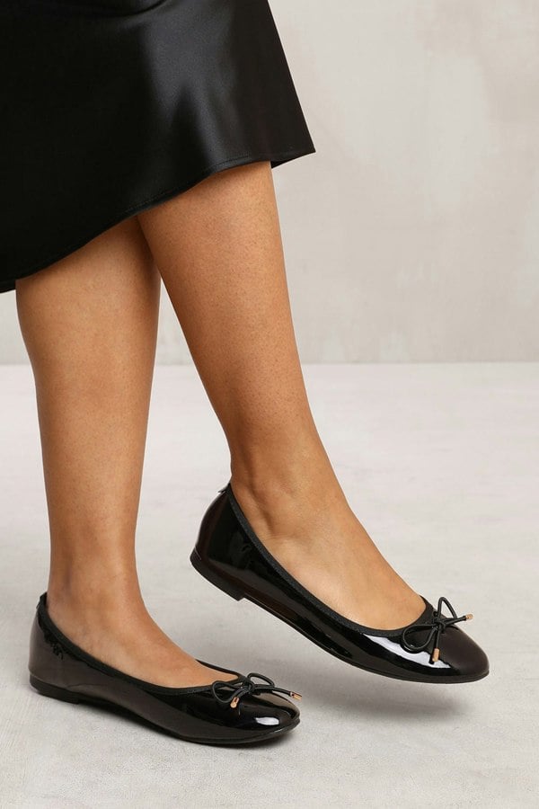 Where's That From Rida Slip on Flat Pumps in Black Patent