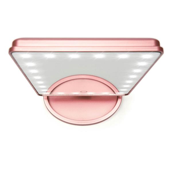 A top view of the Rio Rose Gold 24 LED Makeup Mirror, featuring built-in edge lights, a sleek rectangular design on a circular base, and a removable 10X mini magnifying mirror for flawless application.
