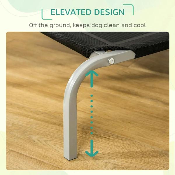 Black mesh dog cot with curved steel legs, elevated off the floor