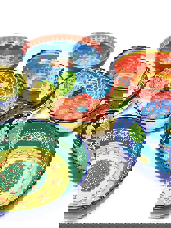 Close up of 6 multi-coloured Spanish tapas bowls